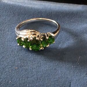 Elegant Silver Ring with Green Stones